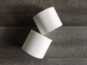 Two bamboo toilet tissue rolls
